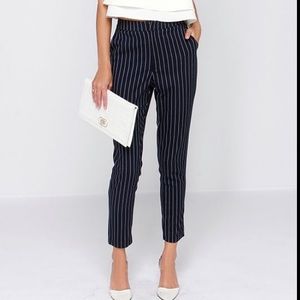 Dark blue chic pants, slight flare, cropped